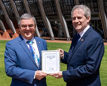 2022 ECU Aspire Award winner Prof Paul Haskell-Dowland receiving his award from Vice-Chancellor Steve Chapman.  