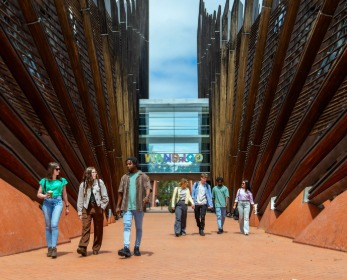 Students walking through the walk way at Building 1 on the Joondalup campus.
