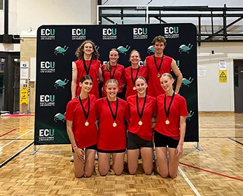 Students wearing medals after winning the 2025 Social Netball Competition. 