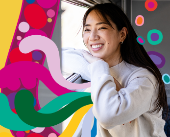 Student looking out a window, representing health and wellbeing support available to international students through Medibank Comprehensive OSHC.